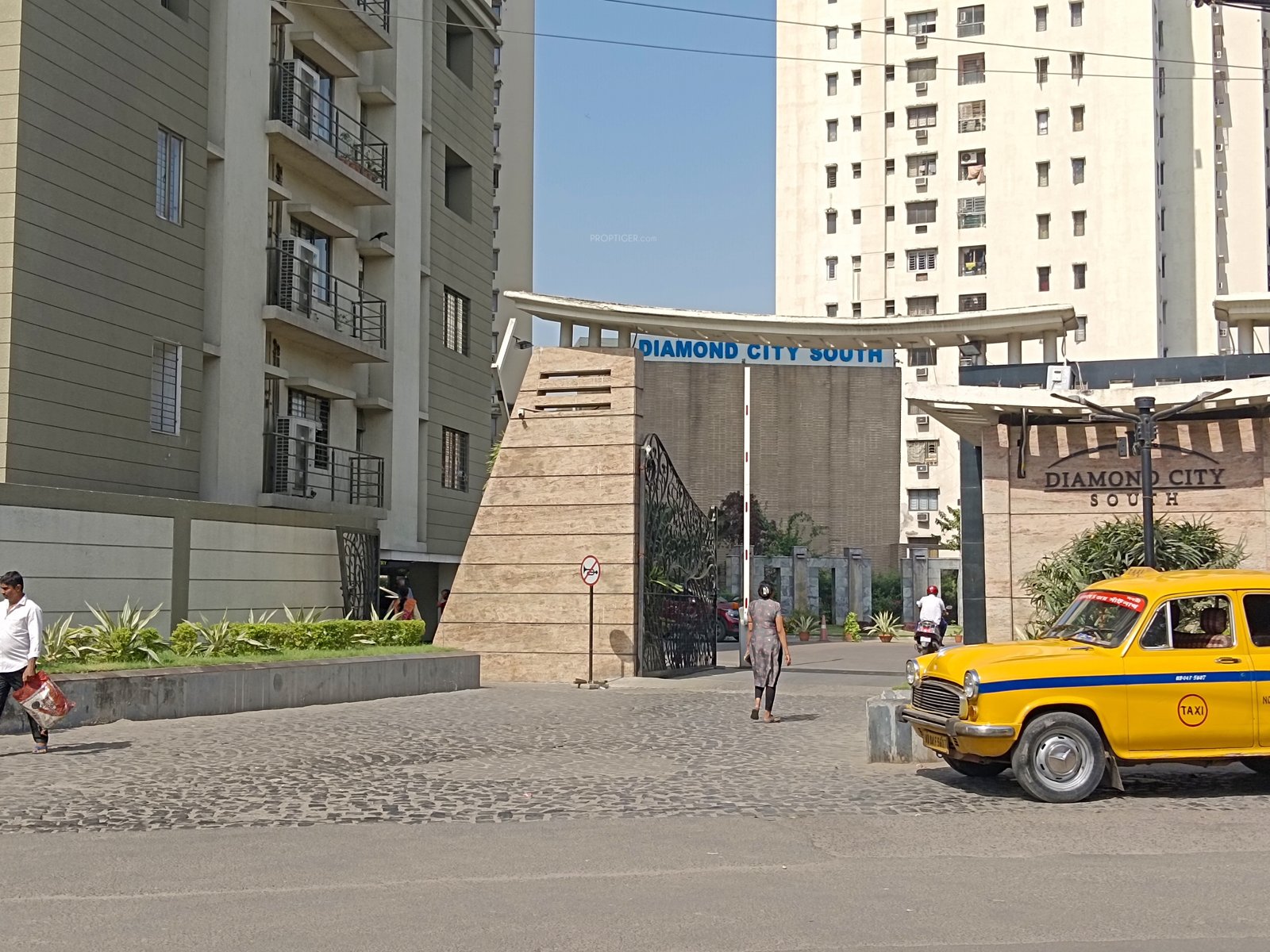 Diamond City South project featuring 100 IP CCTV cameras with face recognition system, biometric access control in every tower, and centralized optical fiber networking by Systech Support